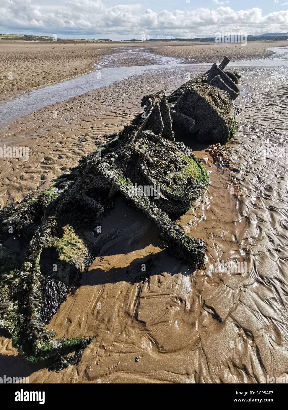 Wrecked WWII X-Class “Midget” submarines rust in Aberlady Bay near Edinburgh. X-Class was built as a new approach for taking down German warships. - Smartphone Captured Stock Image