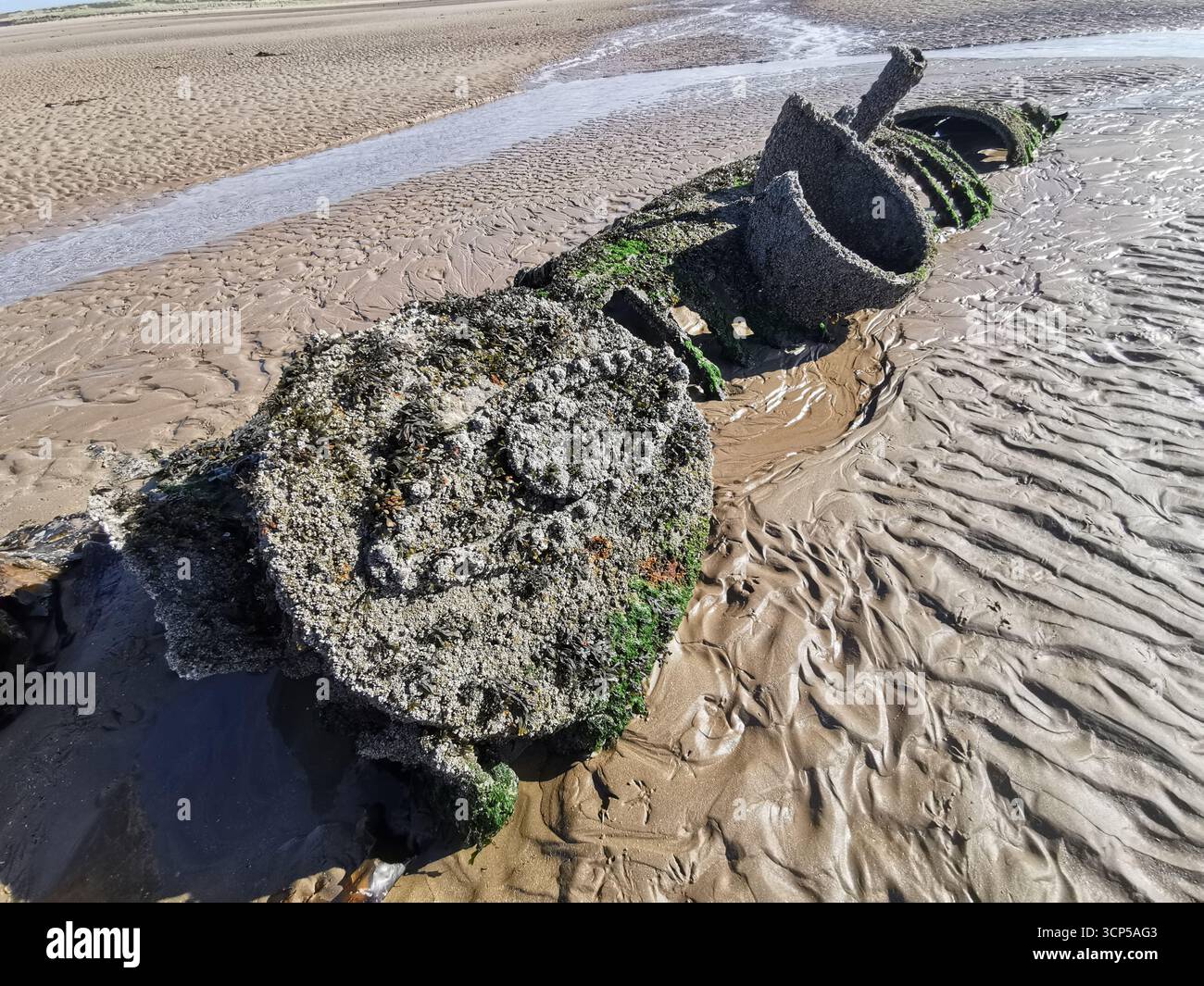 Wrecked WWII X-Class “Midget” submarines rust in Aberlady Bay near Edinburgh. X-Class was built as a new approach for taking down German warships. - Smartphone Captured Stock Image