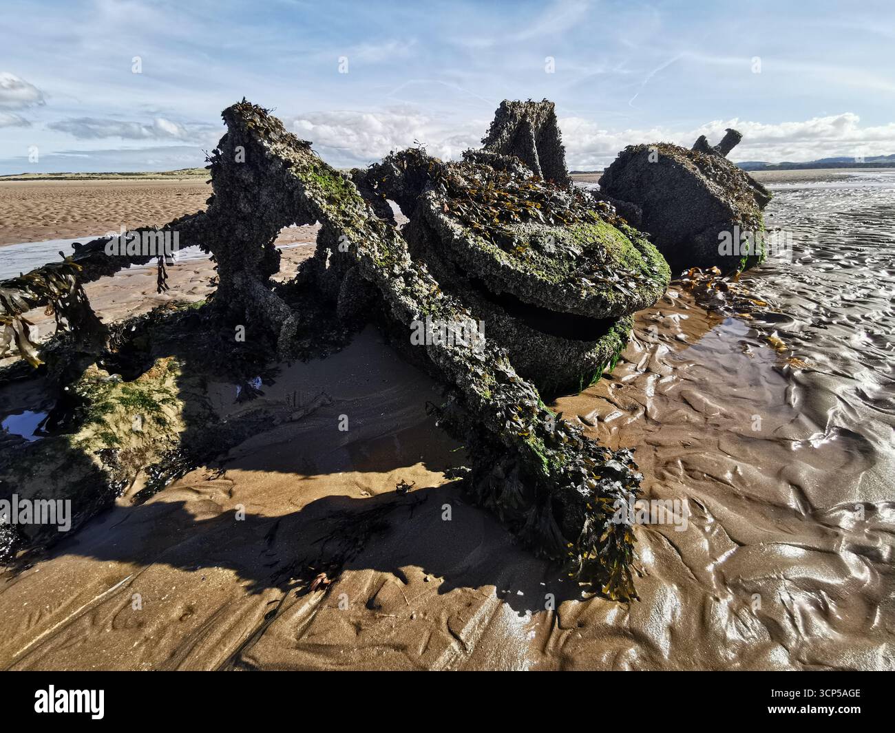 Wrecked WWII X-Class “Midget” submarines rust in Aberlady Bay near Edinburgh. X-Class was built as a new approach for taking down German warships. - Smartphone Captured Stock Image