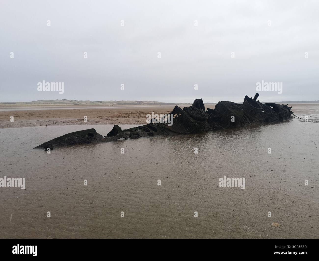 Wrecked WWII X-Class “Midget” submarines rust in Aberlady Bay near Edinburgh. X-Class was built as a new approach for taking down German warships. - Smartphone Captured Stock Image