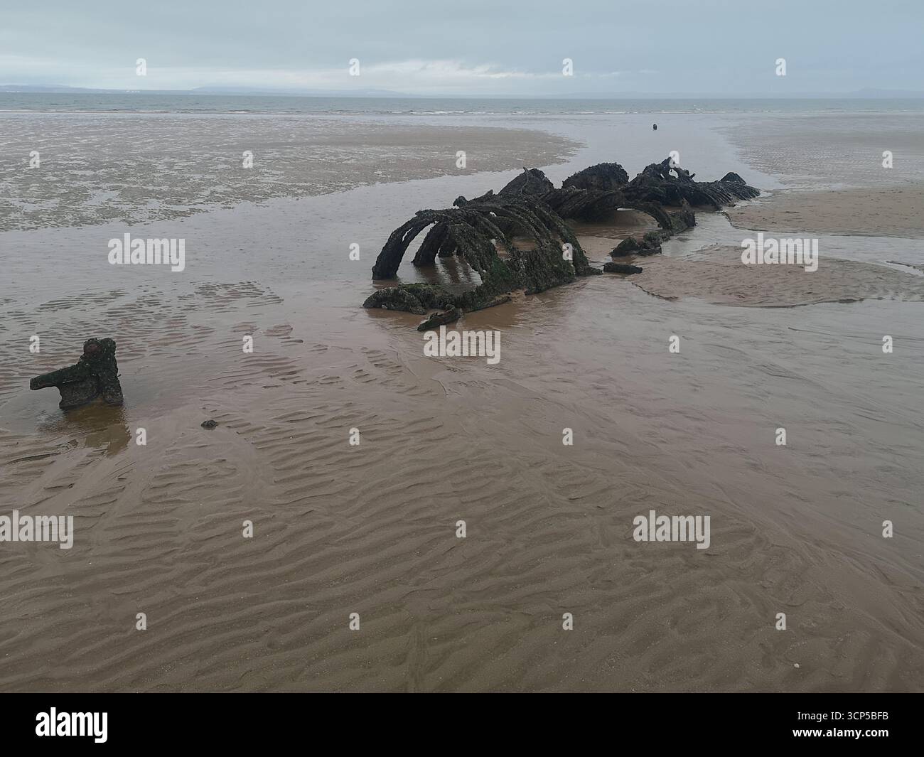 Wrecked WWII X-Class “Midget” submarines rust in Aberlady Bay near Edinburgh. X-Class was built as a new approach for taking down German warships. - Smartphone Captured Stock Image