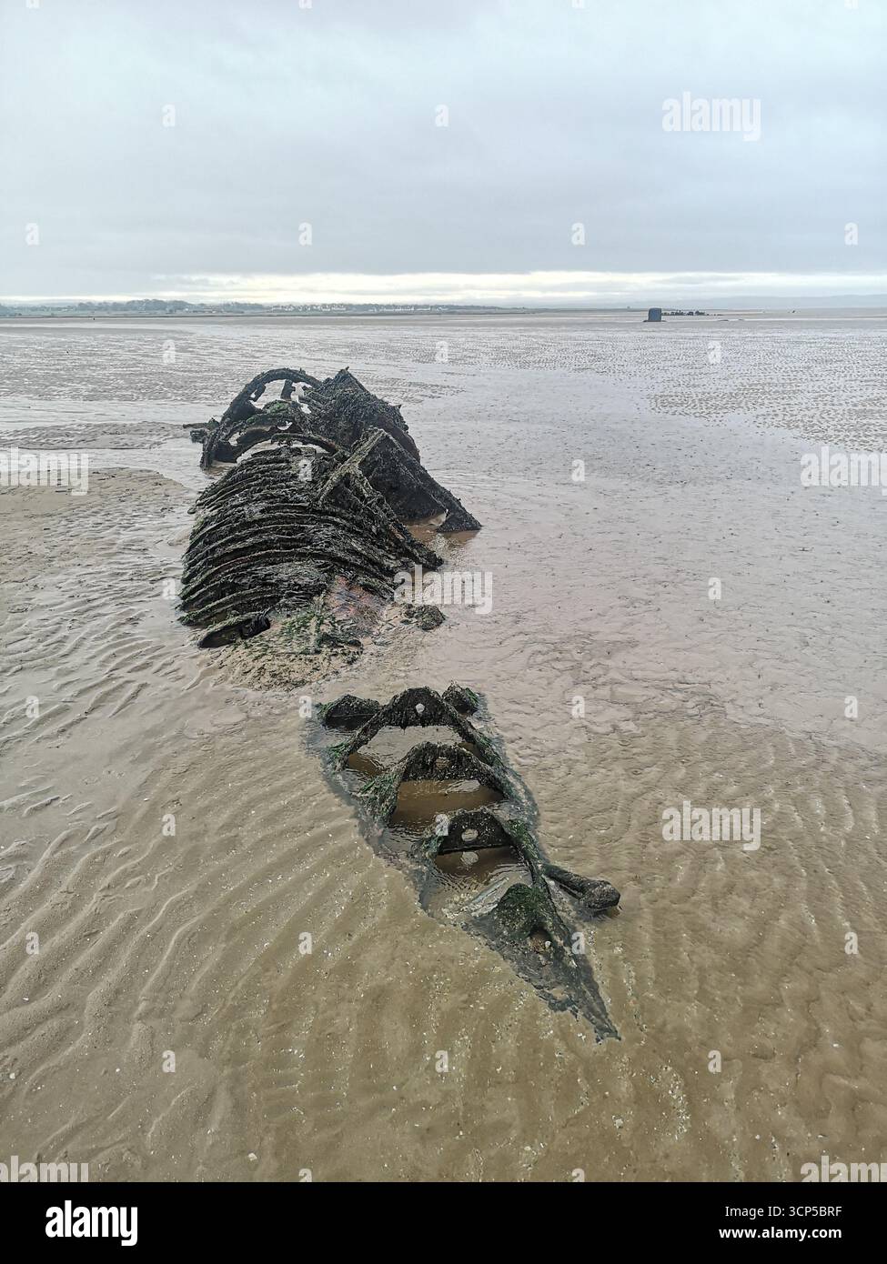 Wrecked WWII X-Class “Midget” submarines rust in Aberlady Bay near Edinburgh. X-Class was built as a new approach for taking down German warships. - Smartphone Captured Stock Image