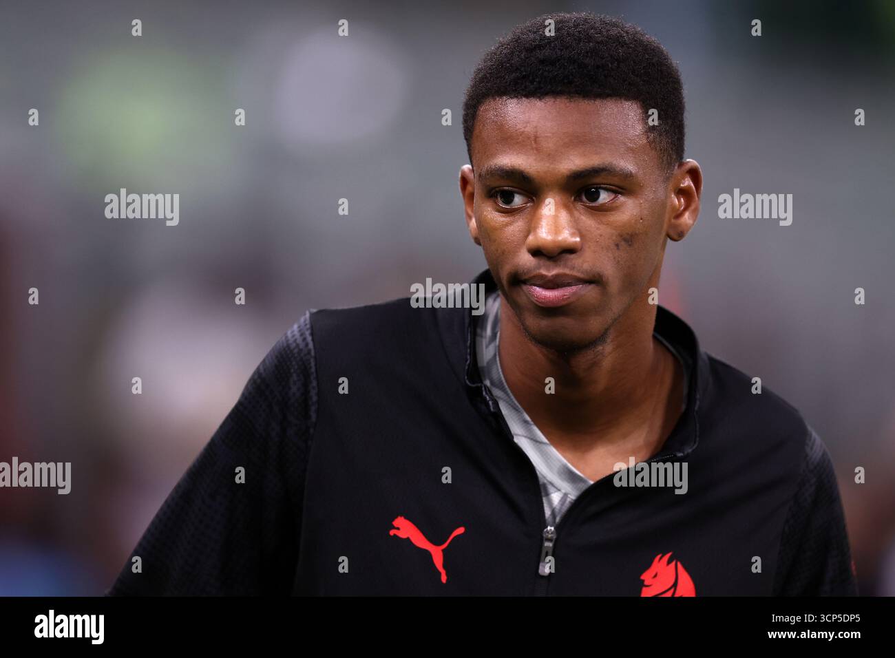 Chevayo Roe Cheveyo Balentien of Ac Milan looks on during the Coppa Italia Round of ...