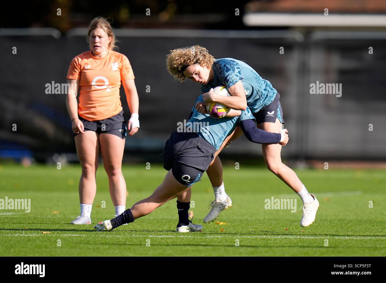 England's Megan Jones tackles Ellie Kildunne (right) during a training ...