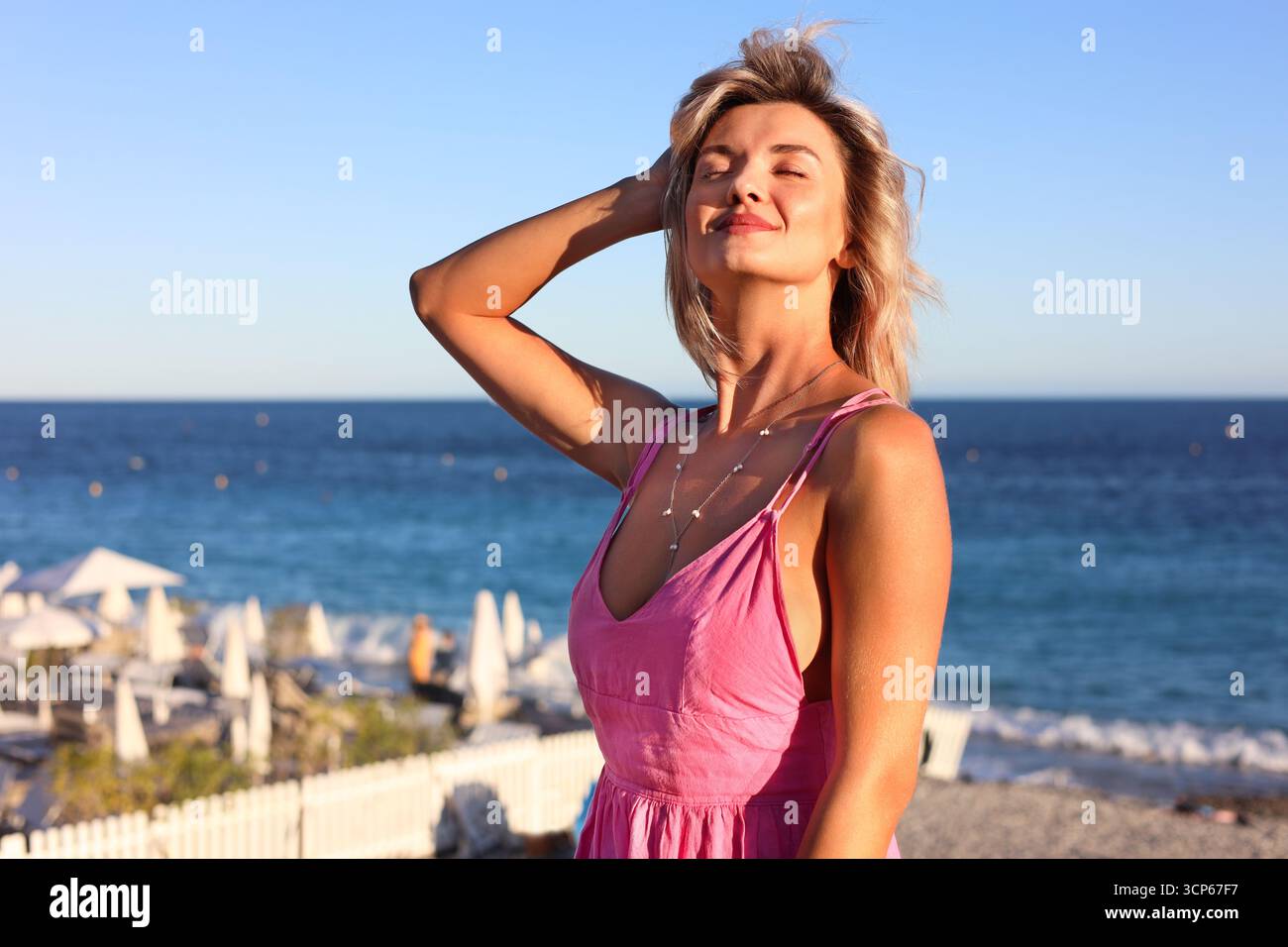 Portrait female tourist posing sea hi-res stock photography and images ...