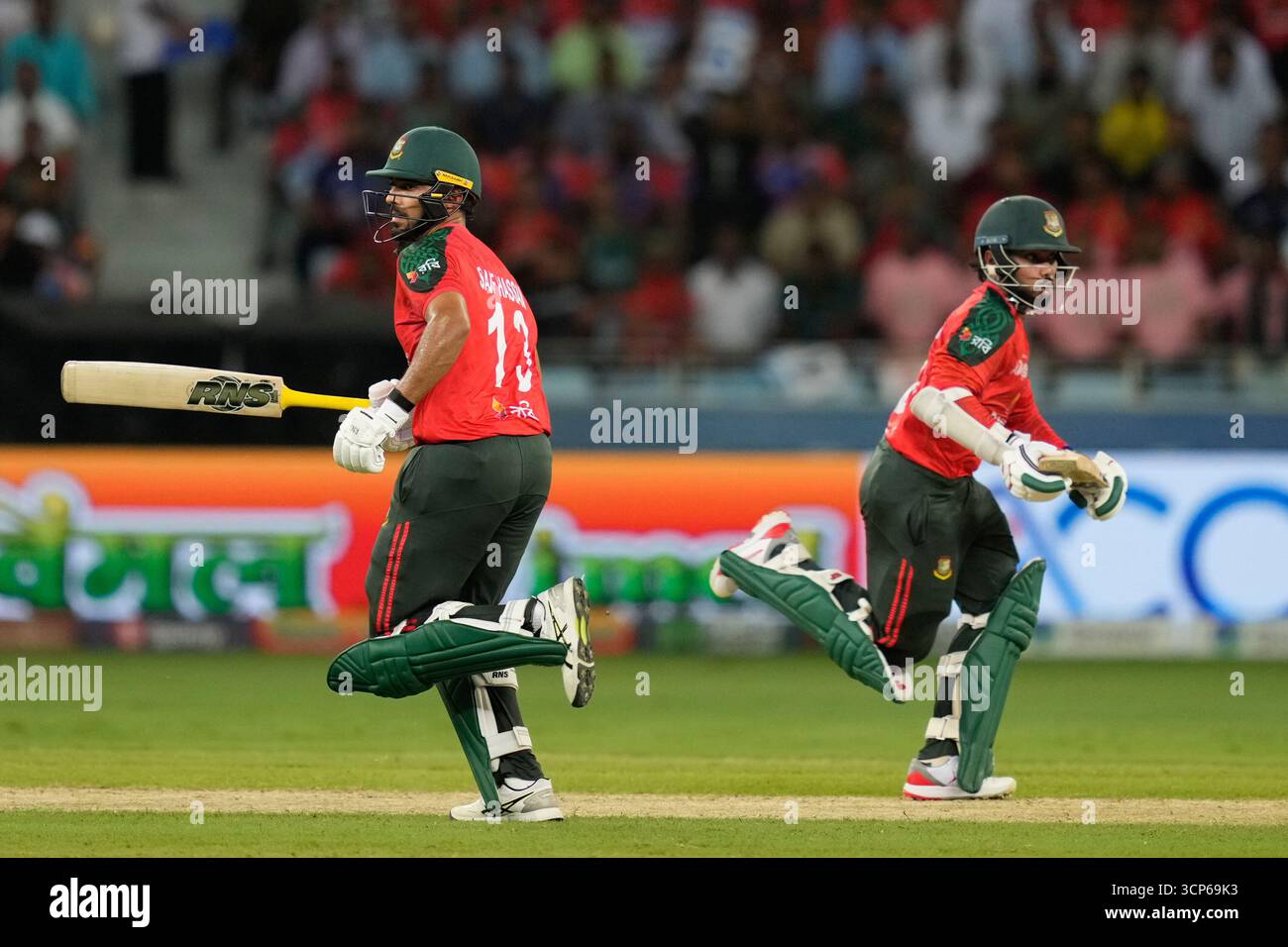 Bangladesh's Saif Hassan, left, and Bangladesh's Parvez Hossain Emon ...