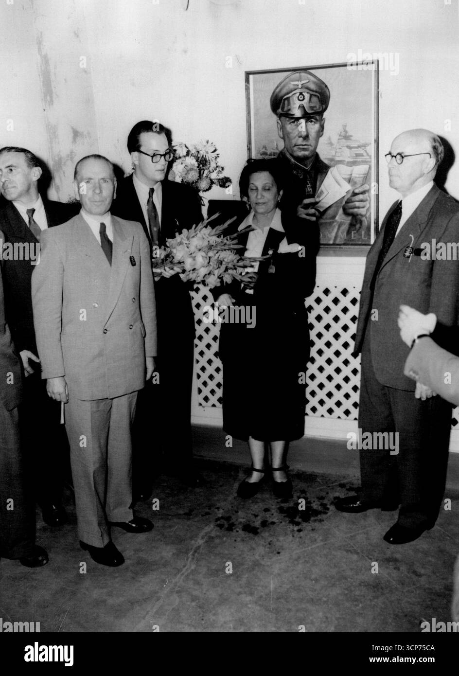 Afrika Korps Veterans Hold ReunionStanding before a painting of Rommel ...