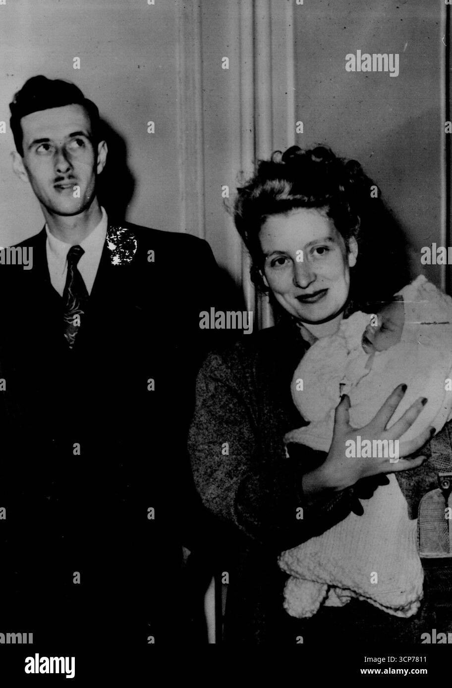 De Gaulle's GrandsonPhillippe De Gaulle, only son of General Charles De Gaulle, and his wife, Henriette De Montalembert, are shown with their first child which has been named Charles after his grandfather. The child was born on 25th September in a clinic at Dijon, where the mother has to stay for the birth, while on a journey from Marseilles to Paris.The Mayor of Dijon a communist Catholic Priest(corrent) Mr Felik Kir, sent flowers to the clinic despite proteste from his followers. He stated the gesture is mafely that of a down honouring distinguished visitor not a political manoeuvd. October Stock Photo