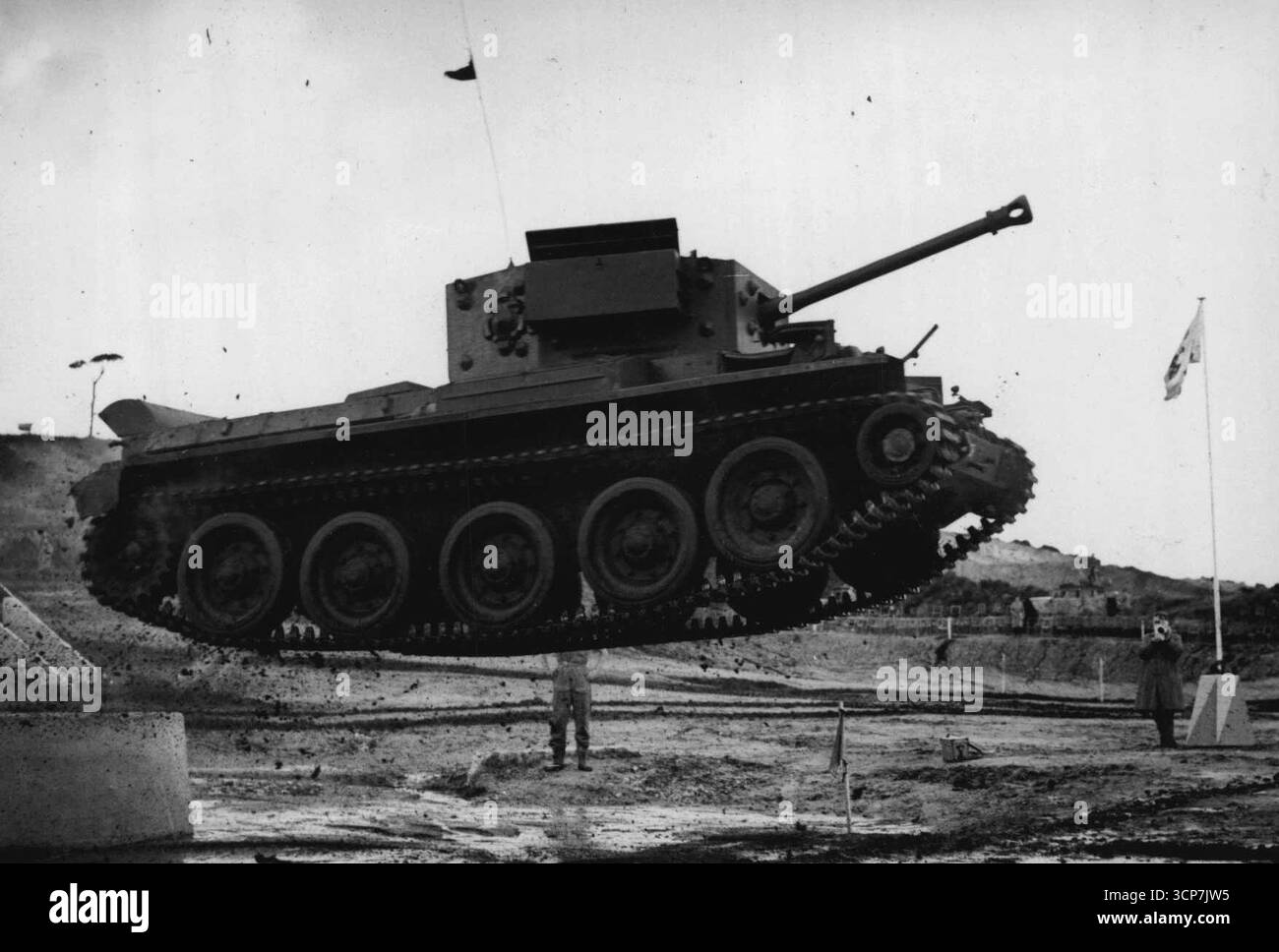 The Airborne Tank - A 28 ton Cromwell tank takes a flying leap over a water obstacle during a demonstration of fighting vehicles of the Royal Armoured Corps at Bovington Camp, Dorset. The jump is being made from a concrete ramp about 9 feet in height. October 31, 1953. (Photo by Sport & General Press Agency, Limited). Stock Photo