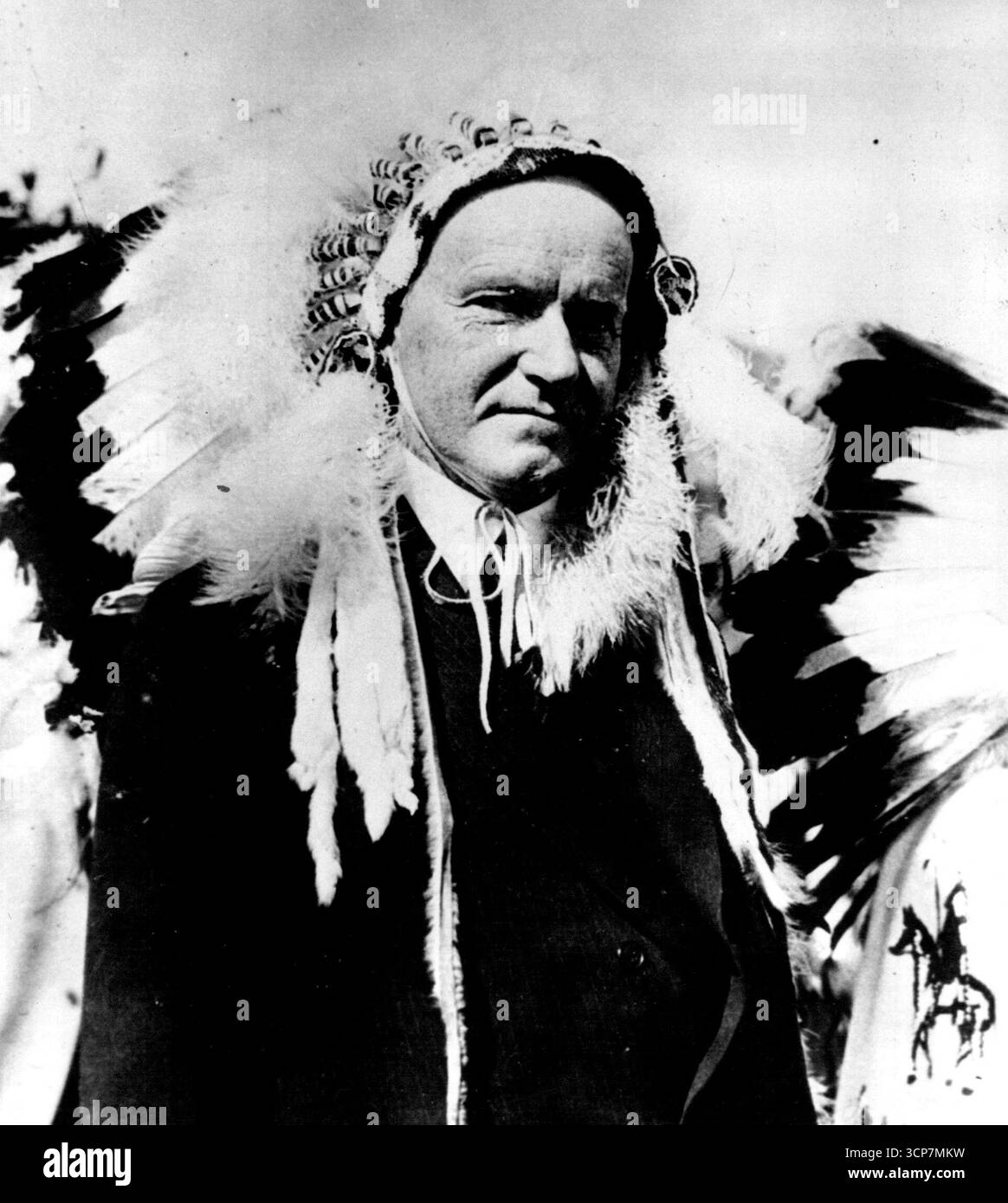 Chief Leading Eagle -- Pres. Coolidge goes native as chief leading eagle of the Sioux Tribe when he was adopted as first white chief of the tribe at the celebration of the 51st anniversary of the settlement of deadwood, S.D. September 8, 1927. (Photo by Associated Press Newsphoto). Stock Photo