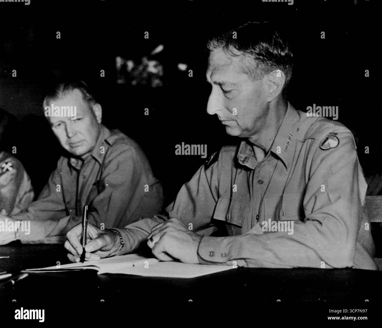Gen. Mark Clark, supreme UN Commander in the far east, affixes his ...