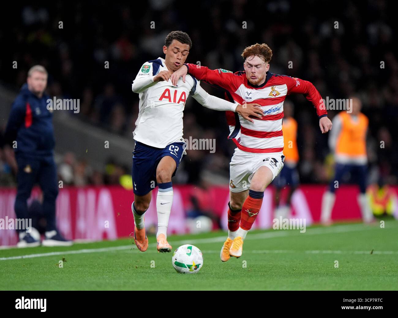 Tottenham Hotspur's Brennan Johnson (left) and Doncaster Rovers Jack ...