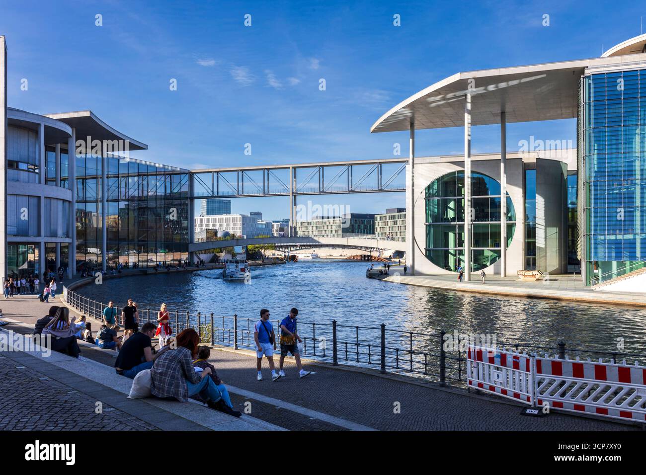 Berlin, Germany, 5 May 2025, Berlin's Marie-Elisabeth-Lueders-Haus and Paul-Loewe-Haus, part of the Bundestag, connected by a pedestrian bridge over t Stock Photo