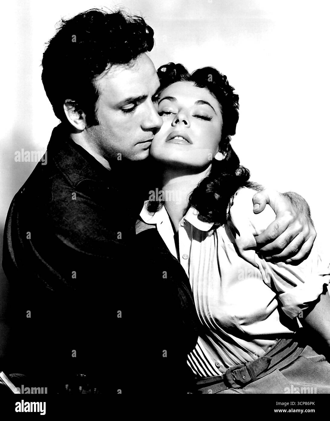 Seven-second Clinch between Dane Clark and Ruth Roman in Warner's Barricade. April 23, 1950. Stock Photo