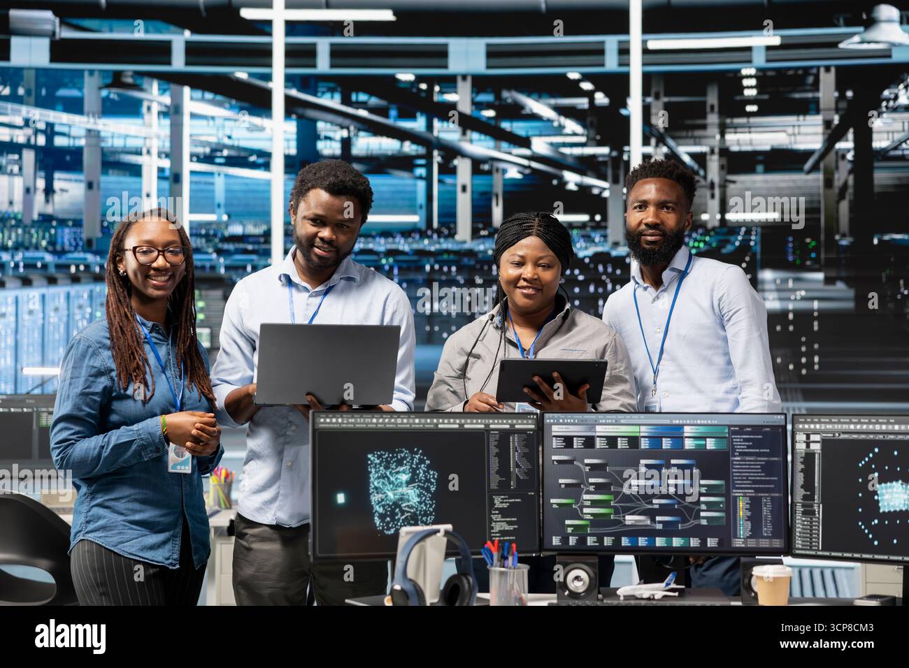 Portrait of smiling server hub engineers using AI algorithms and node trees categorizing and clustering unstructured data. Happy data center coworkers using Natural Language Processing tech Stock Photo