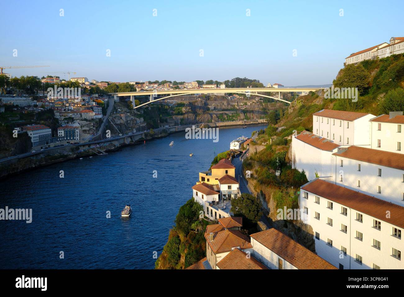 View of Douro River, houses and bridge in Porto, Portugal Stock Photo