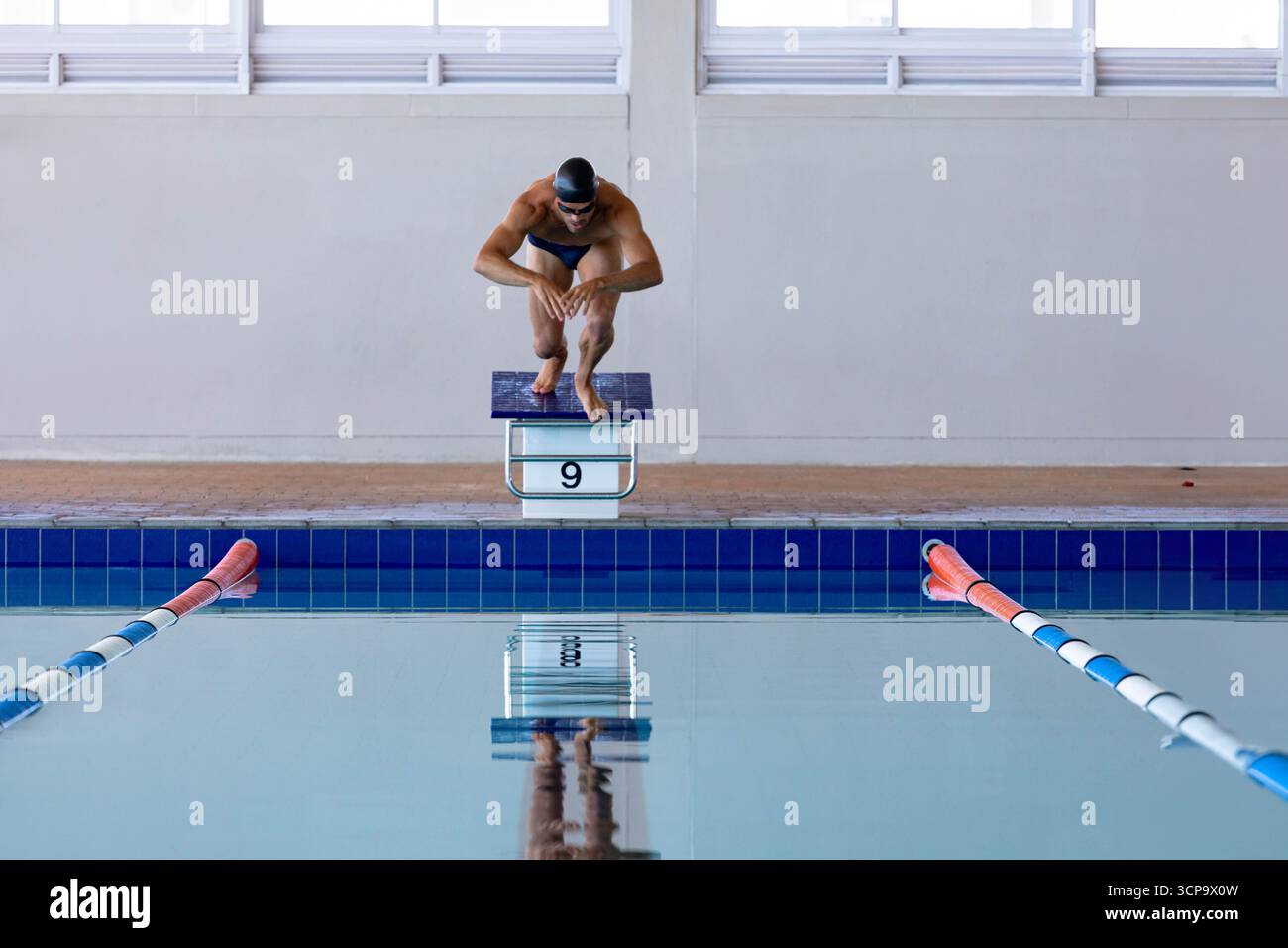 Competitive swimmer wearing black hi-res stock photography and images ...