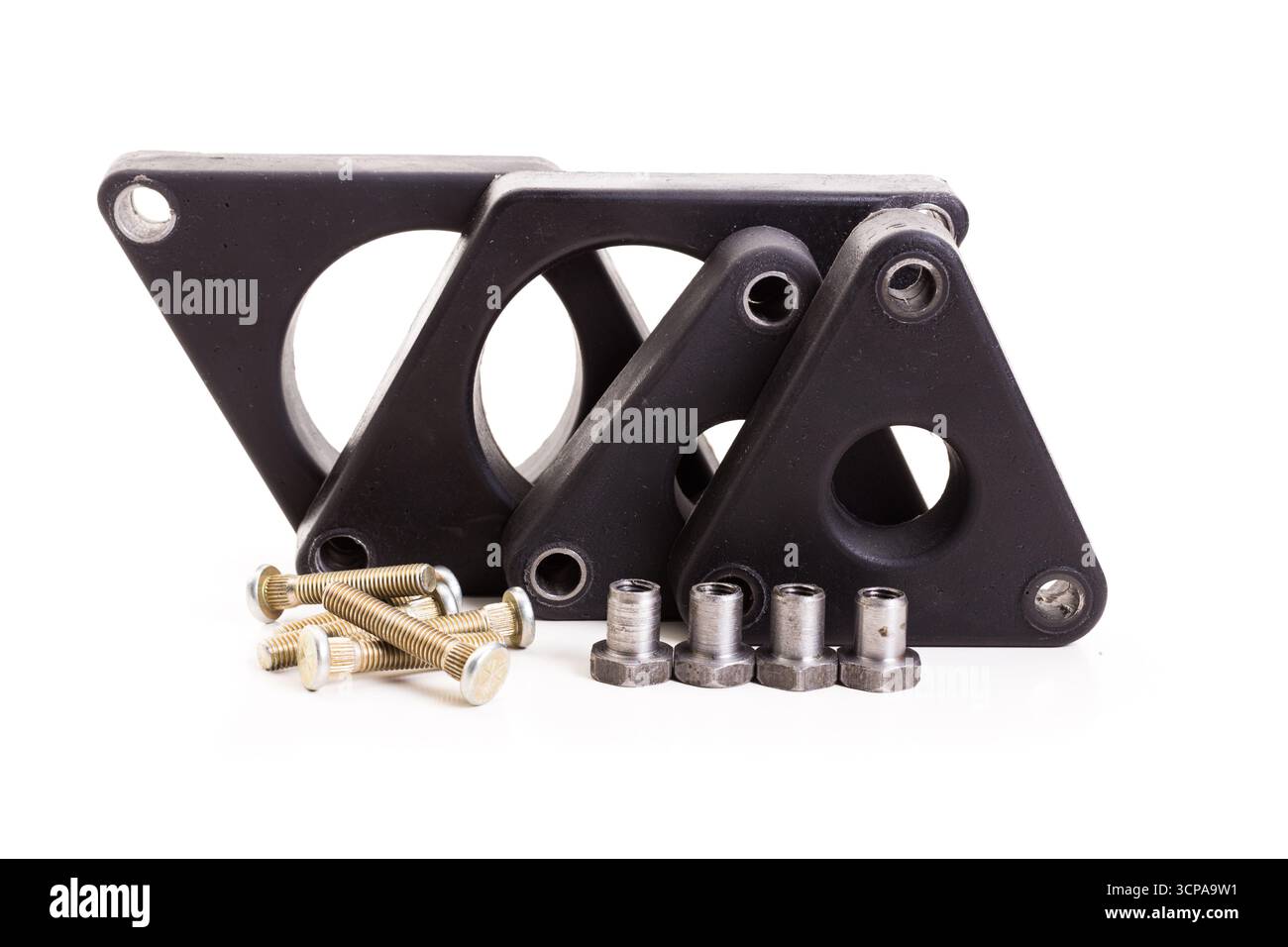 Set of black rubber spacers and bolts for automotive assembly on a white background Stock Photo