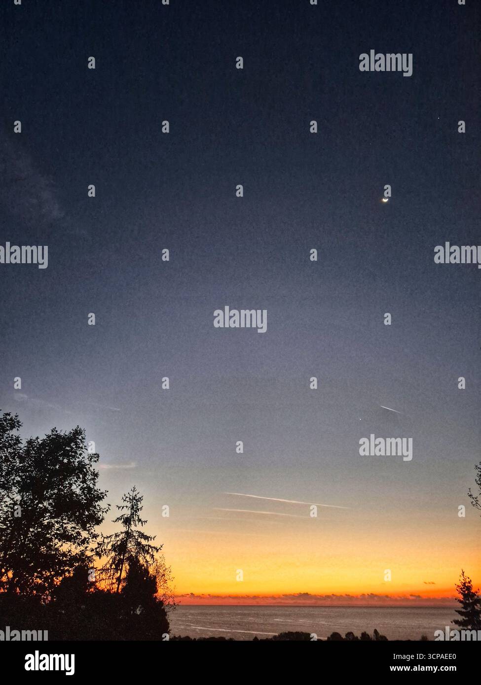 Beautiful sunrise over the sea. Sunset over the sea. Beautiful landscape. picturesque view of outdoor scene. - Smartphone Captured Stock Image