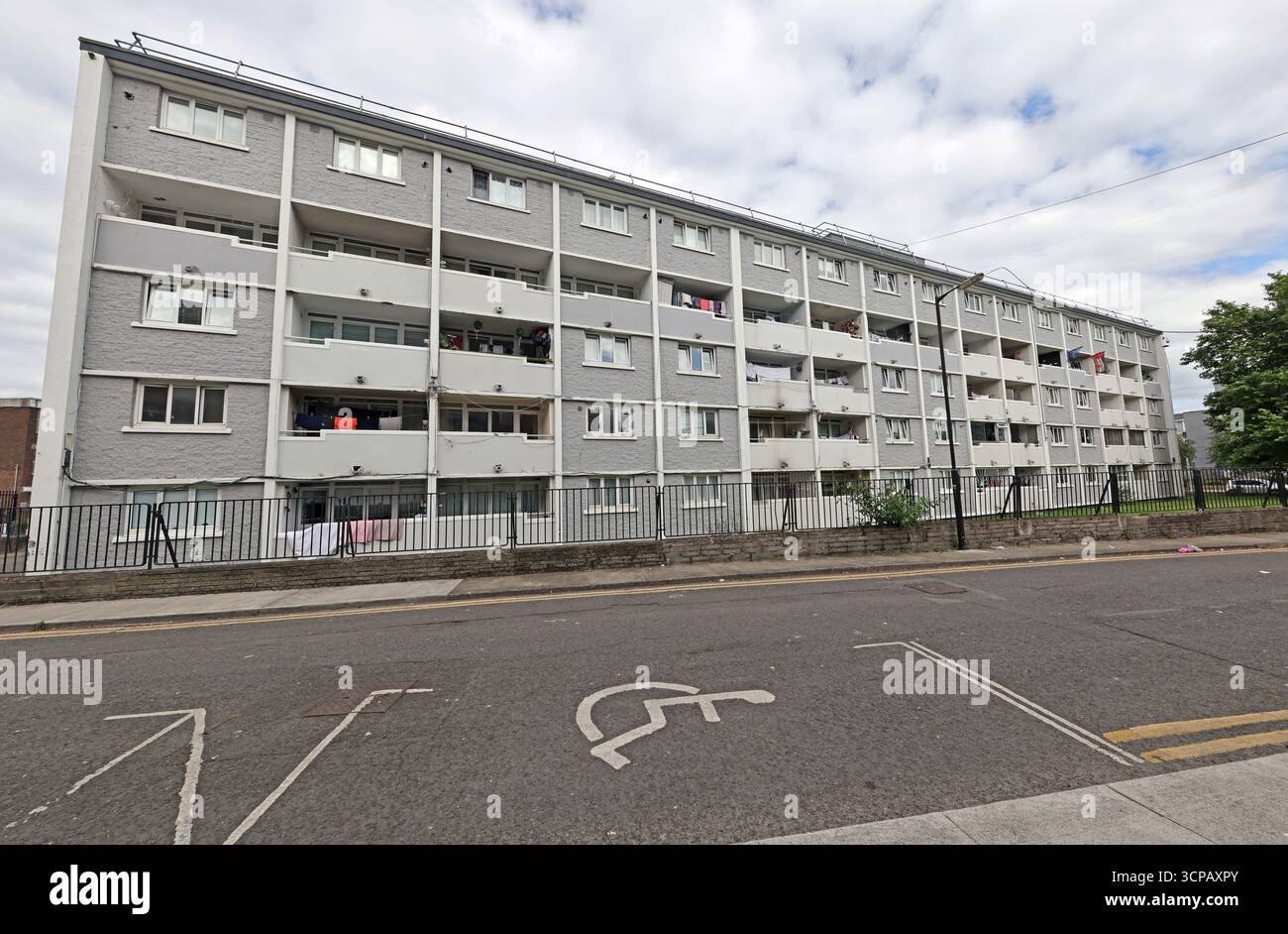 Social housing apartment block with balconies along a residential street in Taylors Lane, Liberties, Dublin, reflecting public housing provision Stock Photo