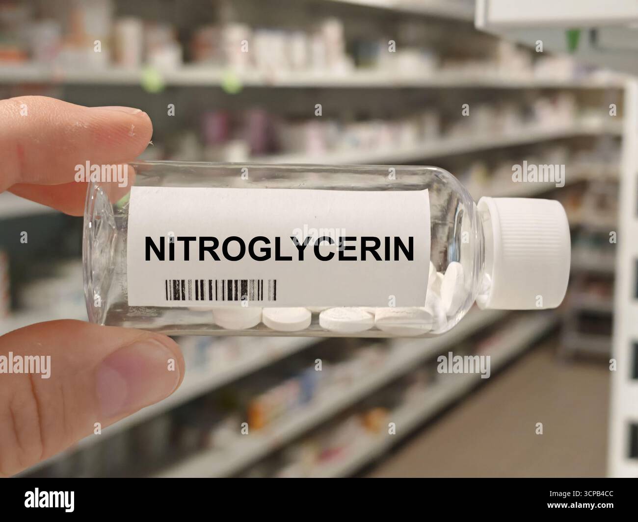 Box of NITROGLYCERIN tablets on a hospital pharmacy table used to treat ...