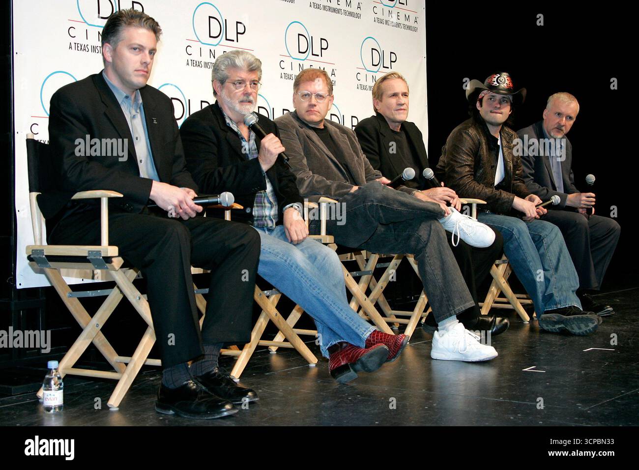Doug Darrow (Business Manager DLP Cinema), George Lucas, Robert Zemeckis, Randall Kleiser, Robert Rodriguez and James Cameron at a press conference for '3D:New Dimensions In Digital Cinema' at ShoWest 2005, Las Vegas, 17 March 2005 Stock Photo