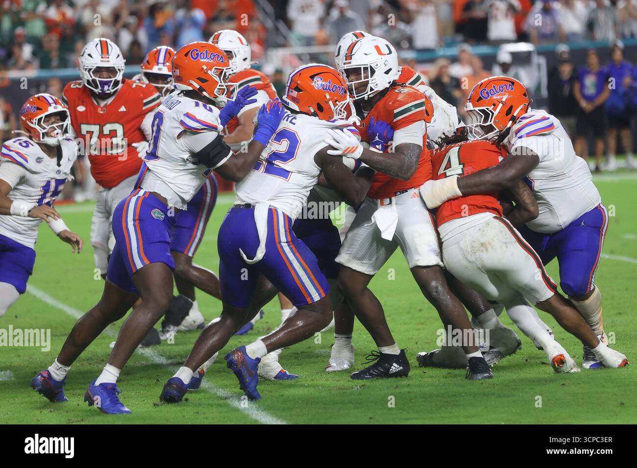 Miami Hurricanes Running Back Mark Fletcher Jr 4 Is Tackled By A