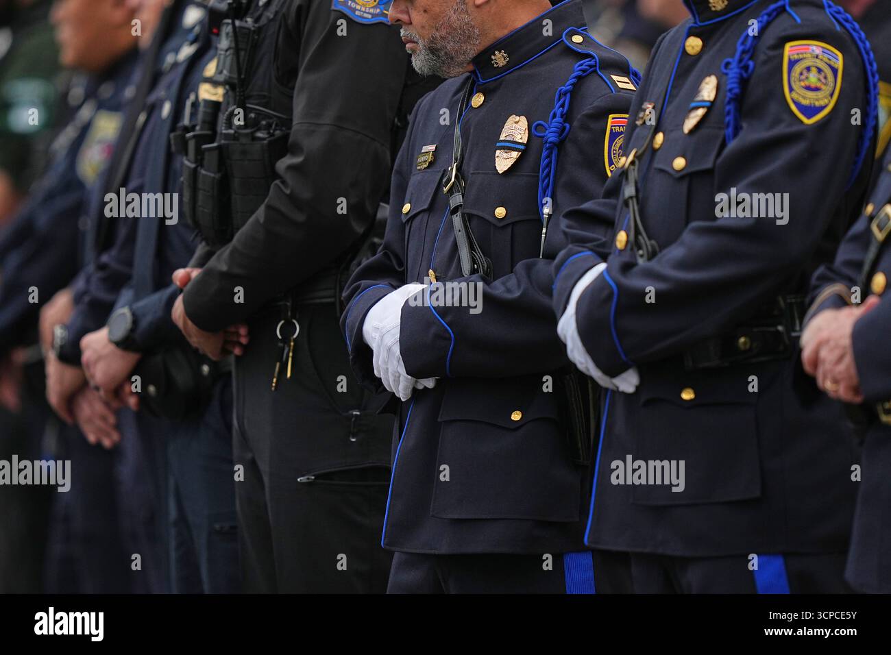 Officers stand in line during funeral services for slain Northern York ...