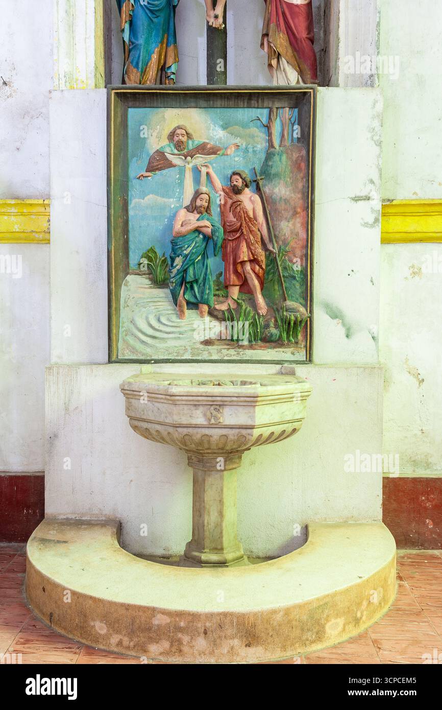 Bas relief of Saint John the Baptist baptizing Jesus at the baptistry ...