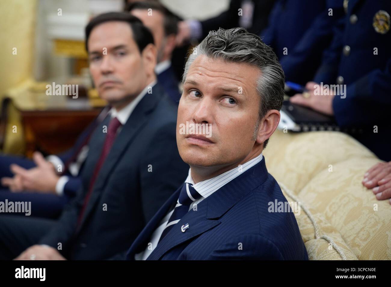 Secretary of War Pete Hegseth (R) and Secretary of State Marco Rubio ...