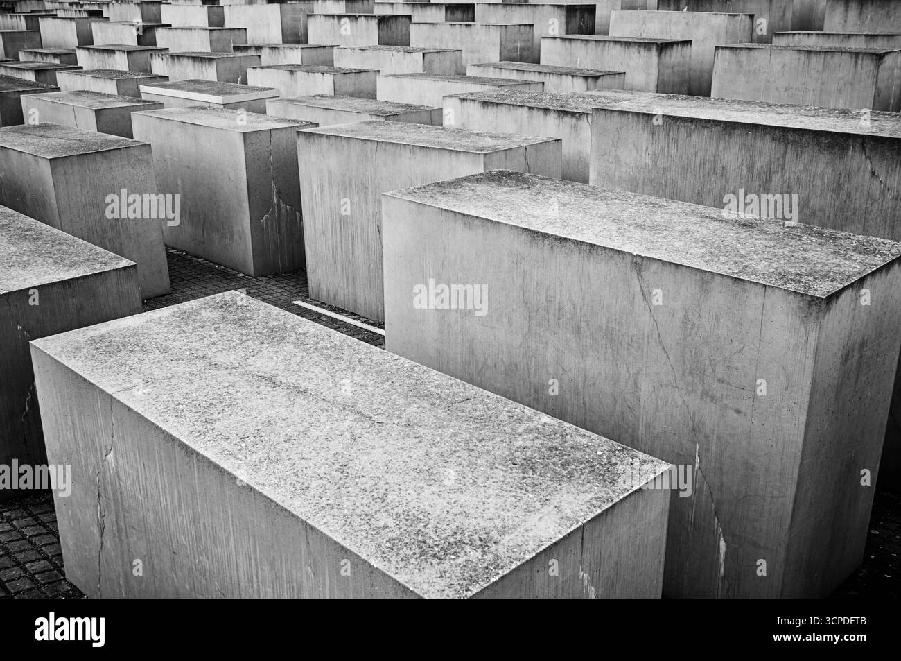 BERLIN, GERMANY - NOVEMBER 9, 2024: A small portion of the concrete blocks (stelae) that are part of the Memorial to the Murdered Jews of Europe desig Stock Photo