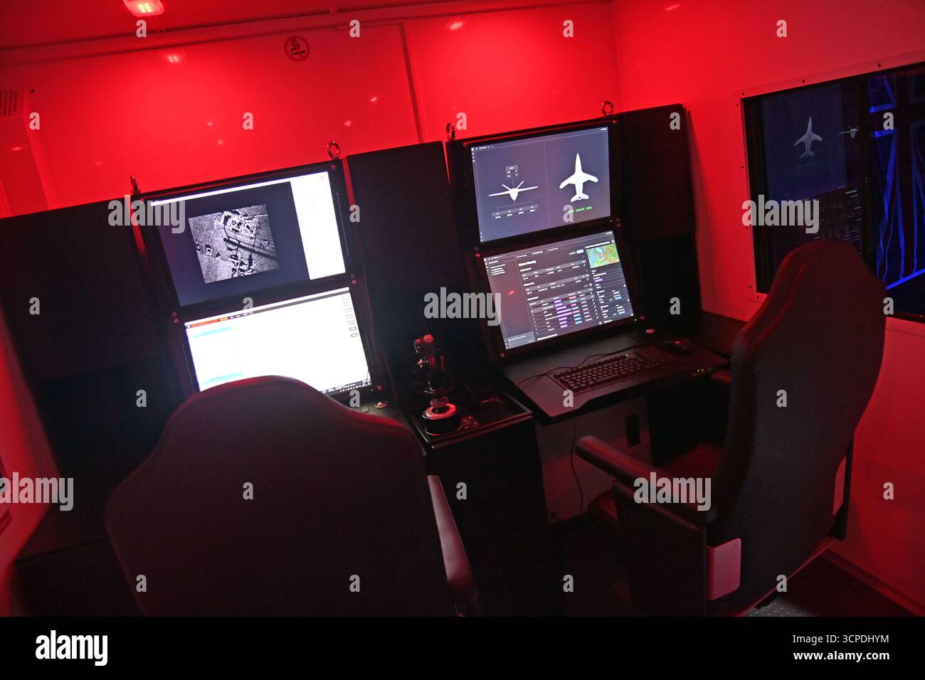 Remote Pilot Station with joystick and monitors. Drone pilots control ...