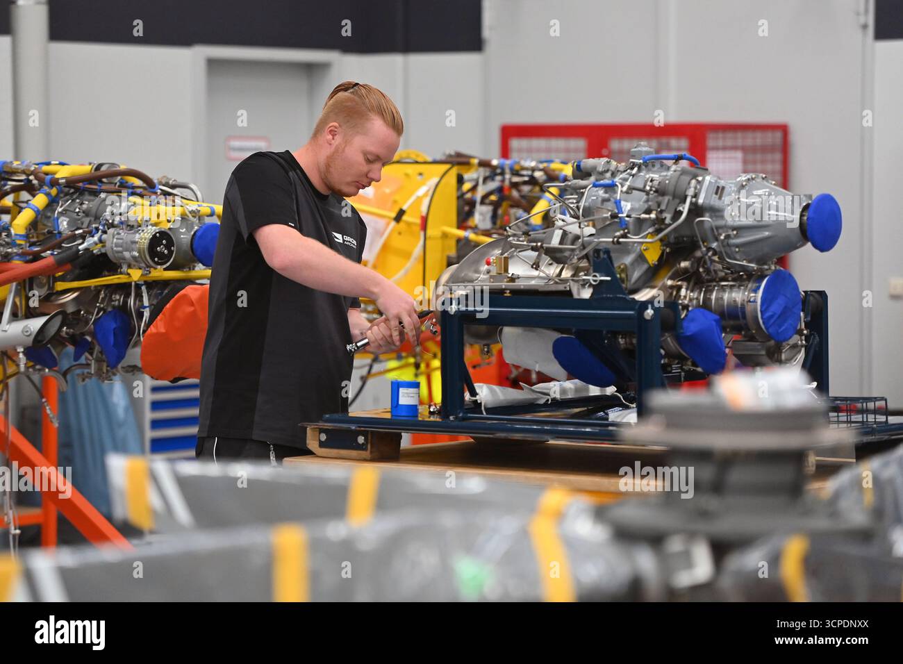 Aircraft construction, skilled worker, aircraft mechanic assembling an ...