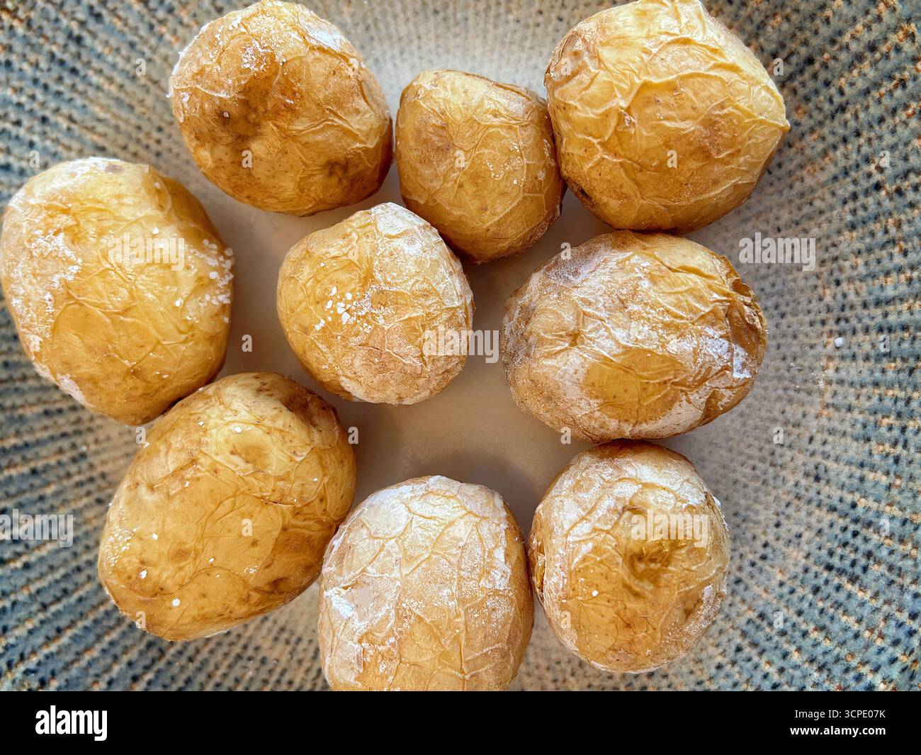 Traditional Canarian Potatoes Papas Arrugadas on a Plate close up. Stock Photo