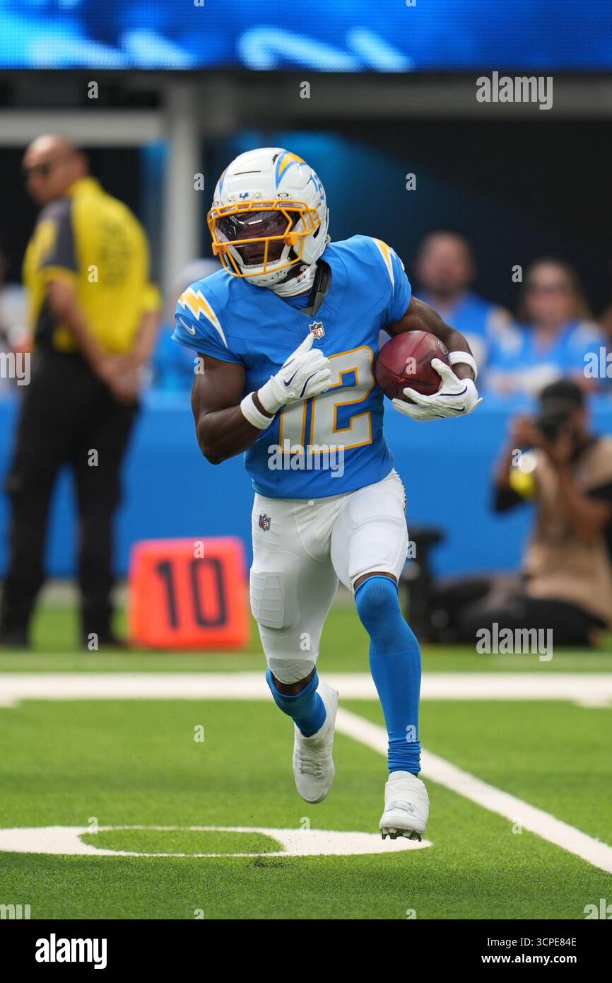 Los Angeles Chargers wide receiver Derius Davis runs with the ball ...