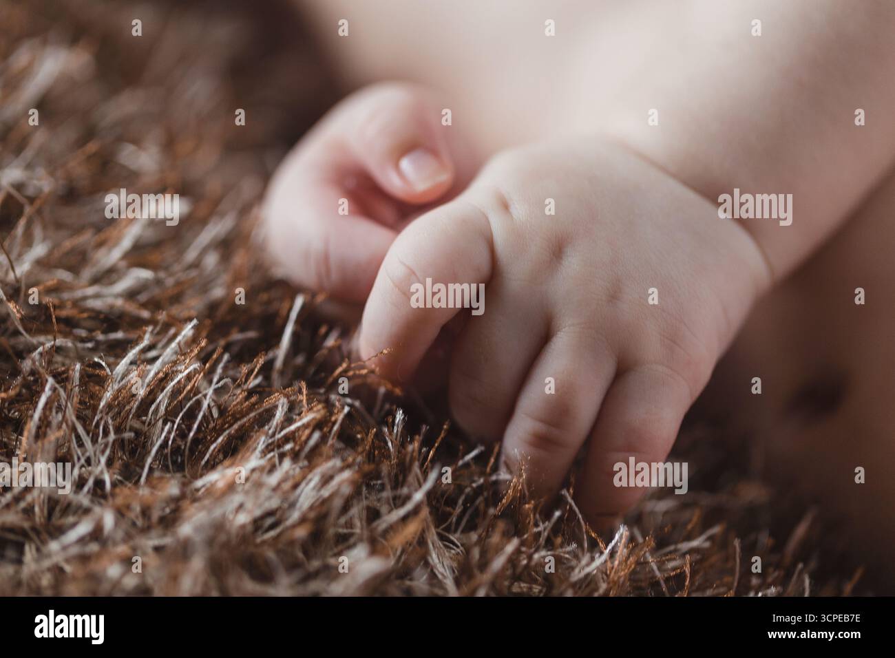 Baby hand reaching out hi-res stock photography and images - Alamy