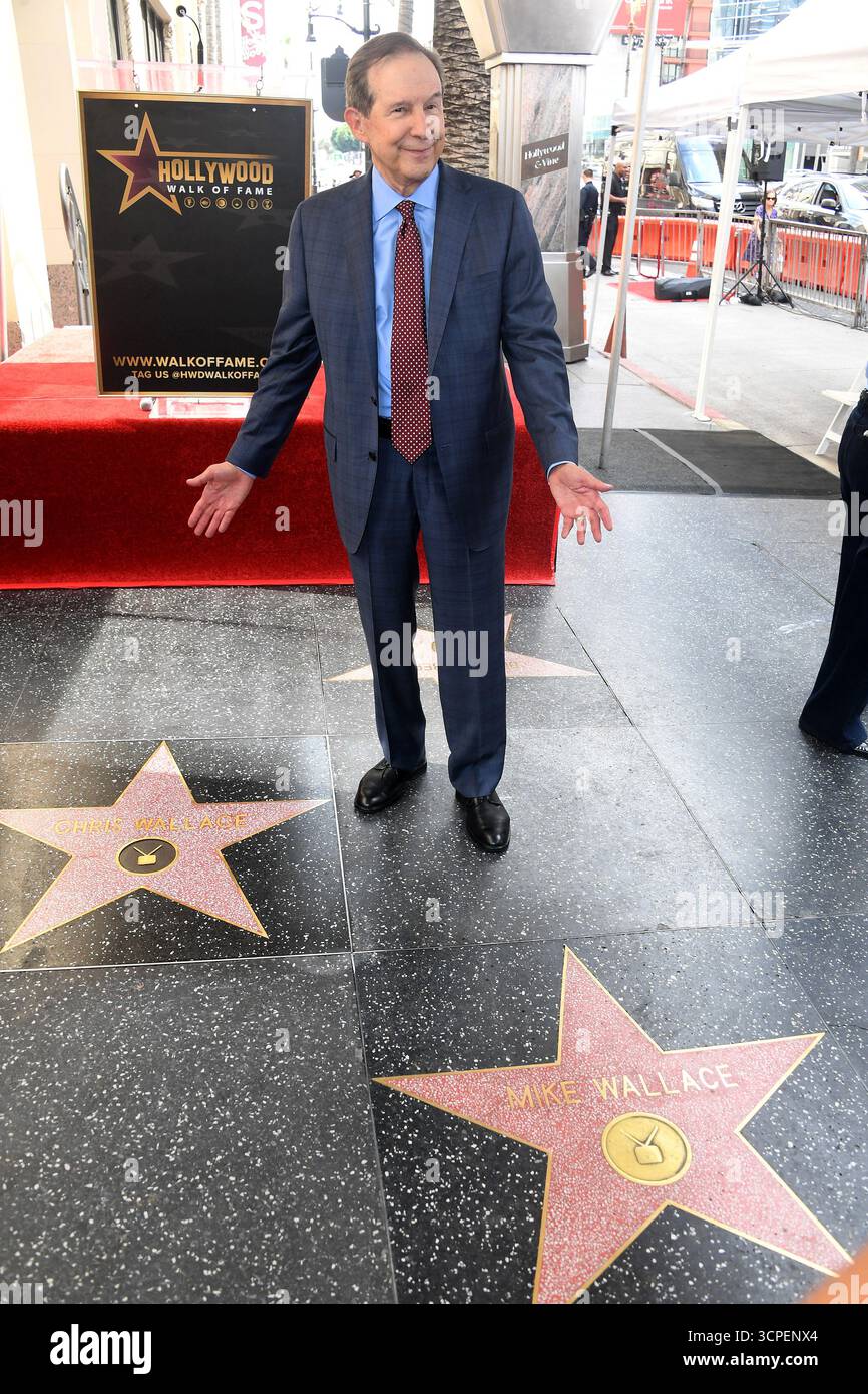 Television Journalist Chris Wallace poses between his Star and his ...