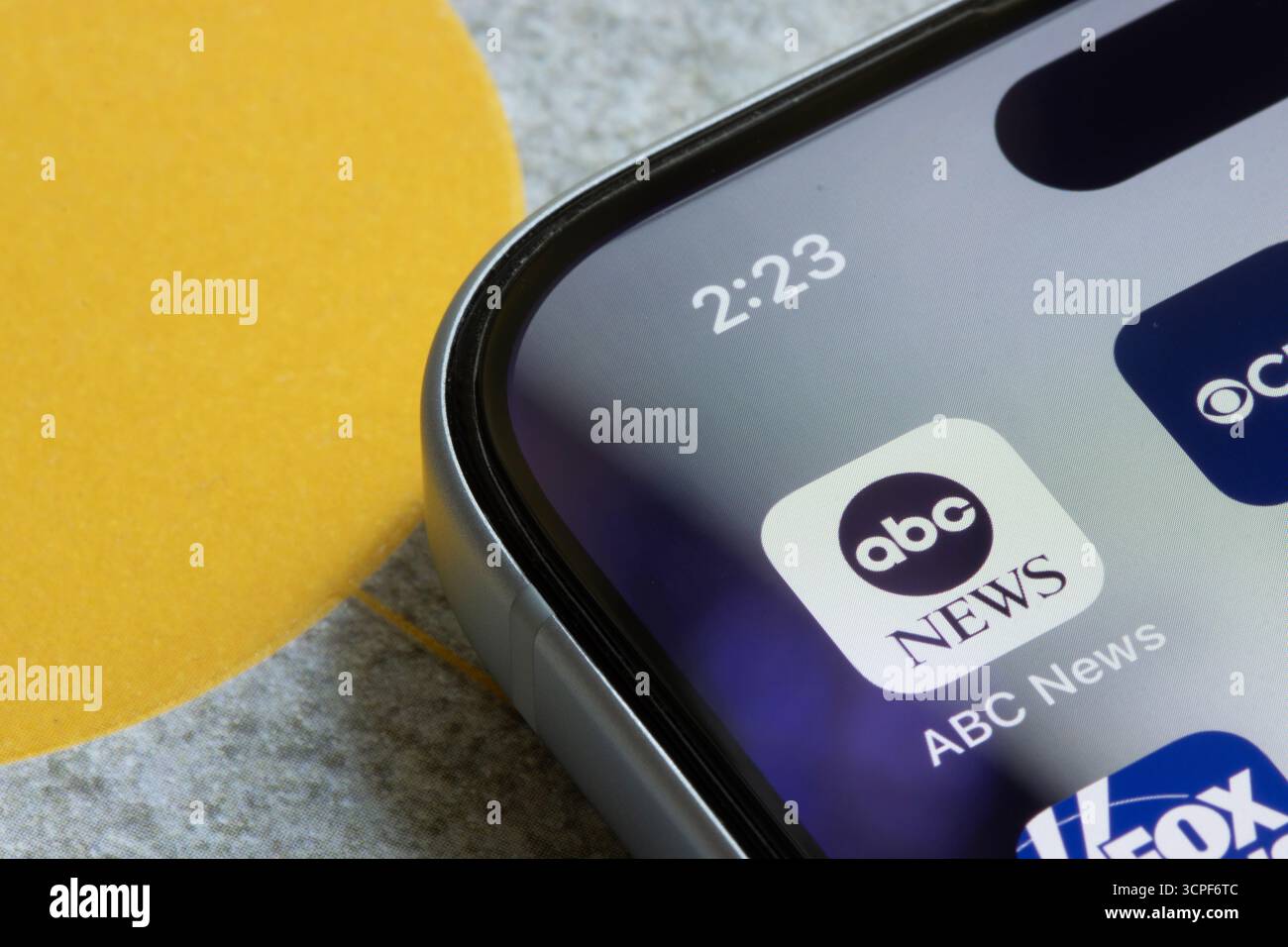 ABC News app icon is seen on an iPhone. The American Broadcasting Company is owned by the Disney Entertainment division of the Walt Disney Company. Stock Photo