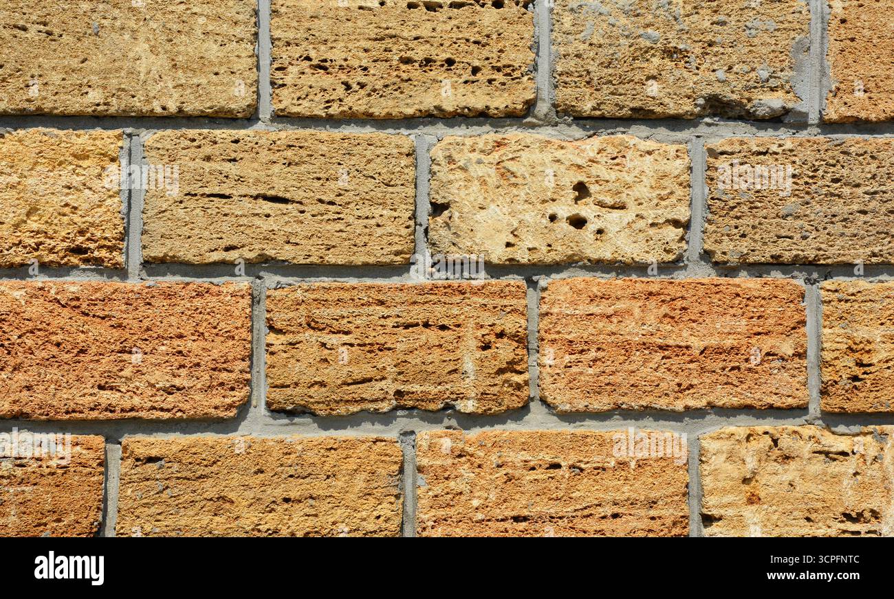 Natural limestone wall texture background from natural limestone blocks Stock Photo