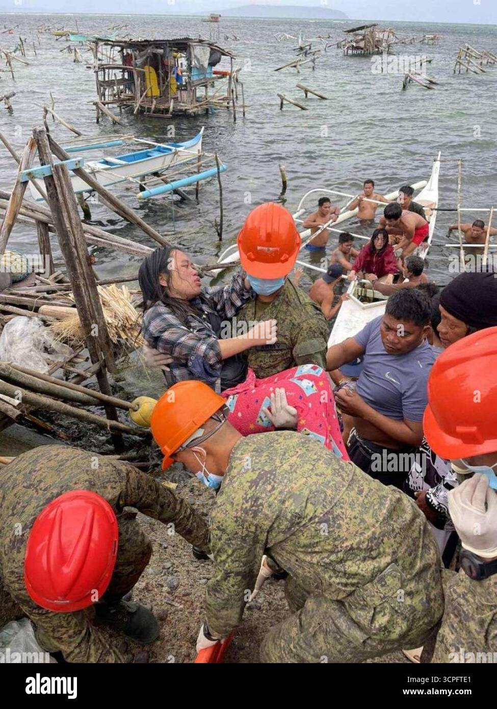 Philippine Rescuer Model In this photo provided by the Philippine Army, troopers from the 63rd ...