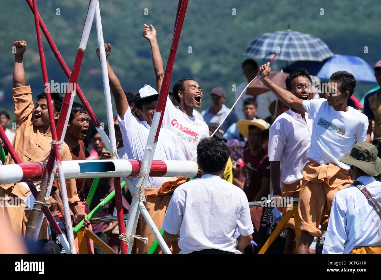 Intha ethnic people celebrate during a traditional boats racing ...