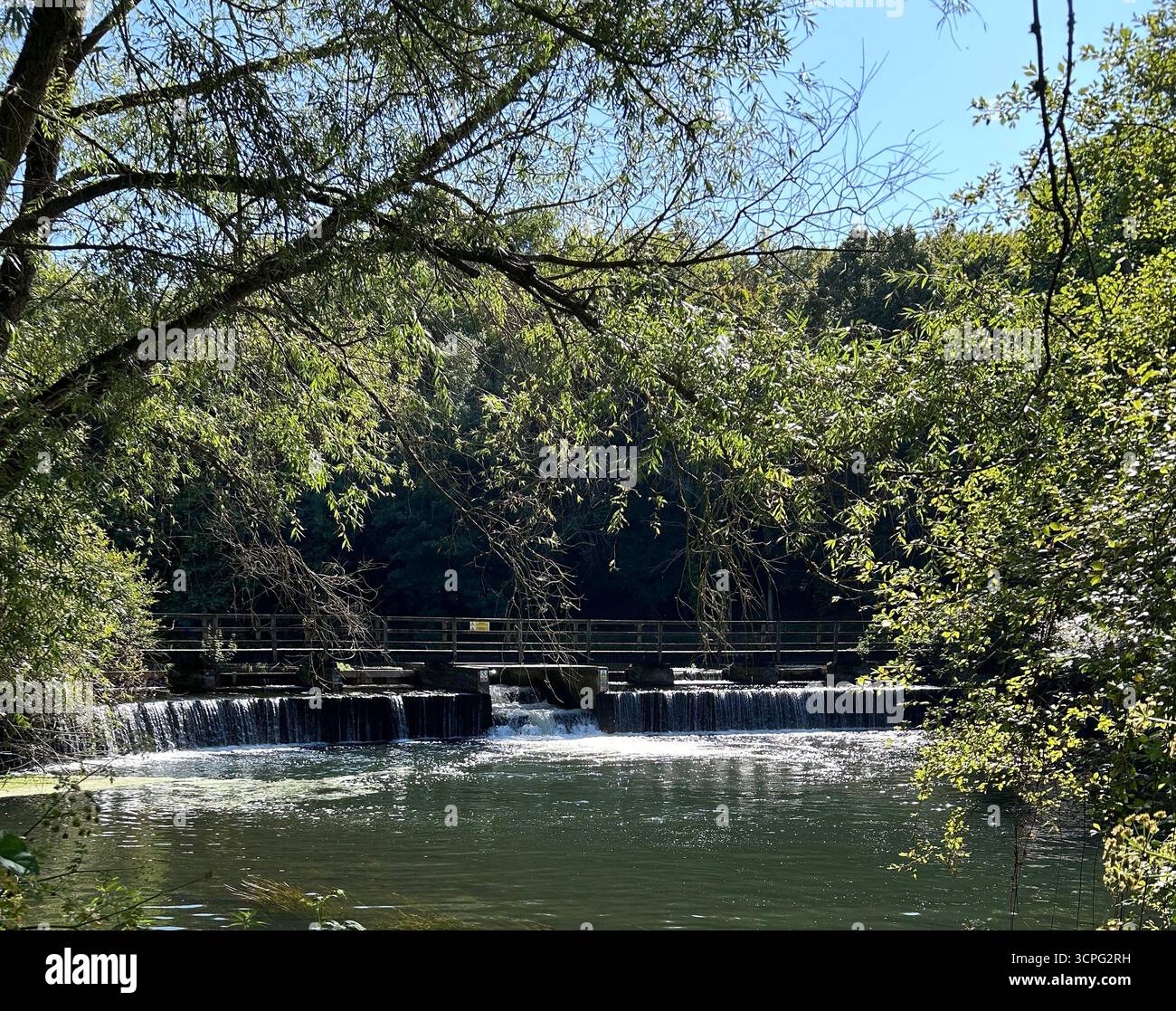 Scenic view of a weir on the River Avon near Downton, Wiltshire, UK - Smartphone Captured Stock Image