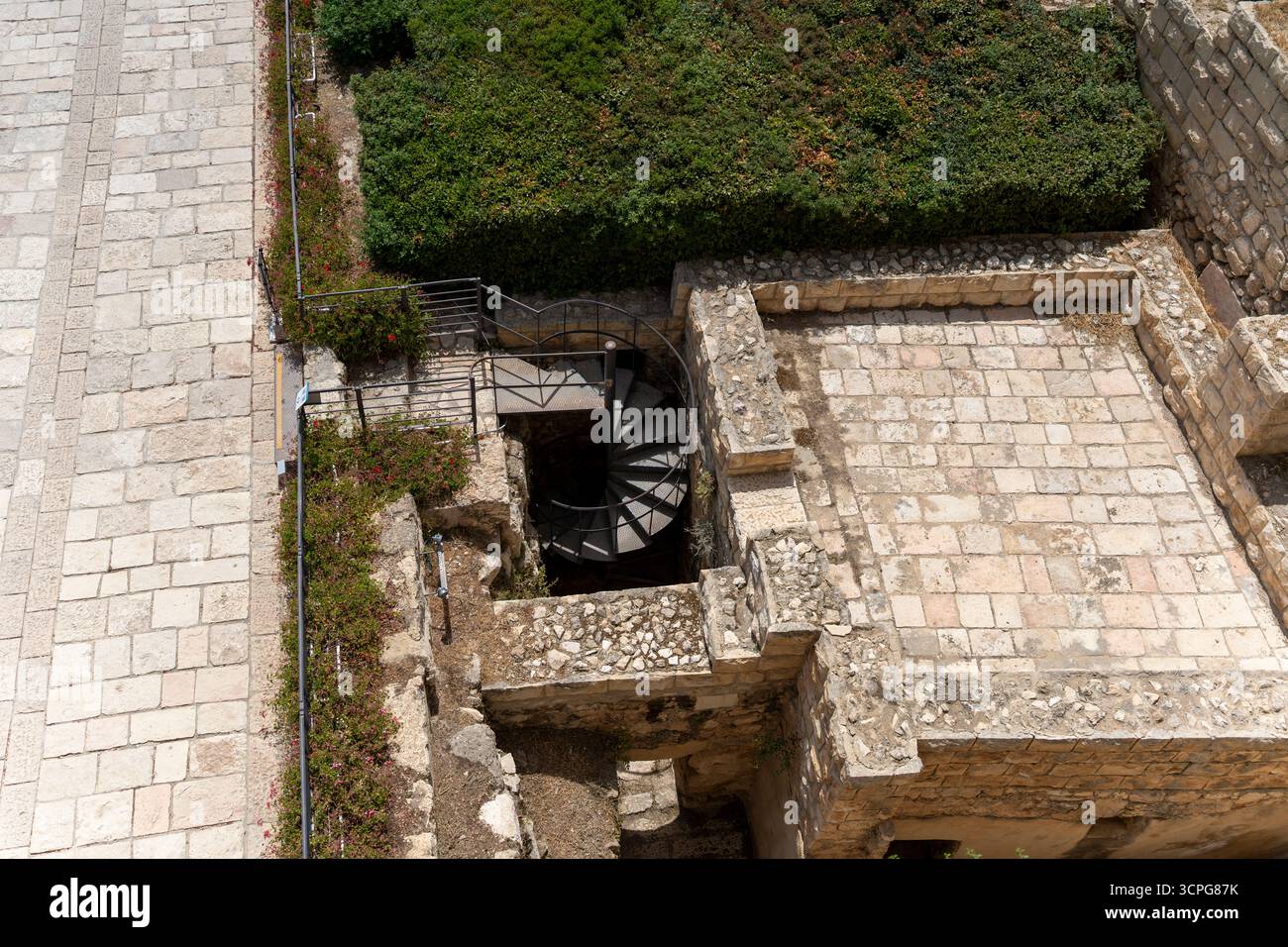 Overhead view of a spiral staircase descending into archaeological excavations near the Temple Mount, Jerusalem. Stock Photo