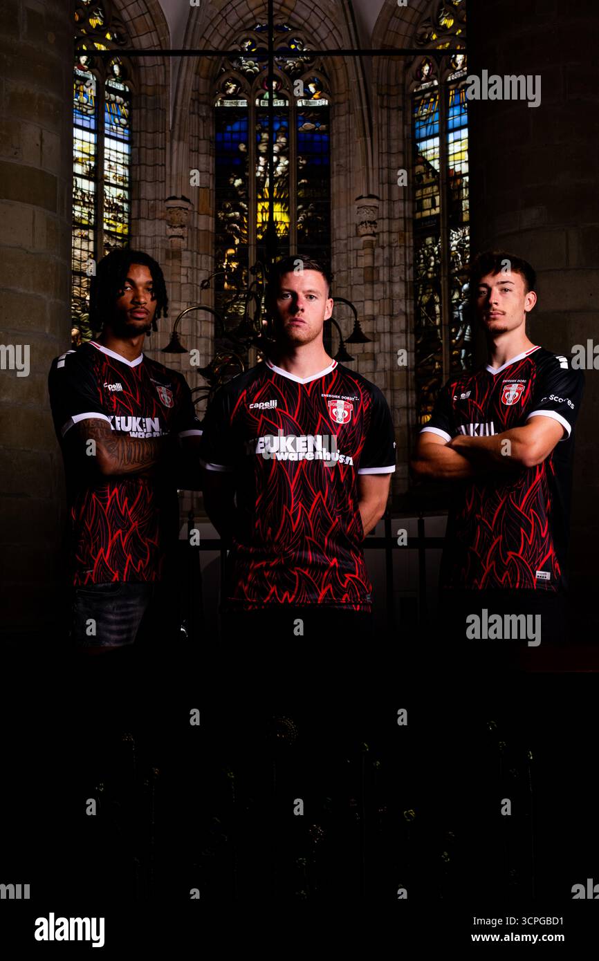 Dordrecht - Yannick Eduardo of FC Dordrecht, Nick Venema of FC Dordrecht, Lawson Sunderland of FC Dordrecht during the presentation of the 3rd kit of FC Dordrecht. The kit is based on the city fire of 1457 in Dordrecht. The photos are taken at Grote Kerk, Onze-Lieve-Vrouwekerk on 22 September 2025 in Dordrecht, The Netherlands. (VK Sportphoto/Nick Koole) Stock Photo