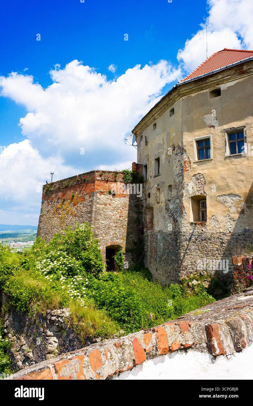 mukachevo, ukraine - may 25, 2008: palanok castle in summertime. old fortification now serves as the museum and is popular tourist landmark of transca Stock Photo