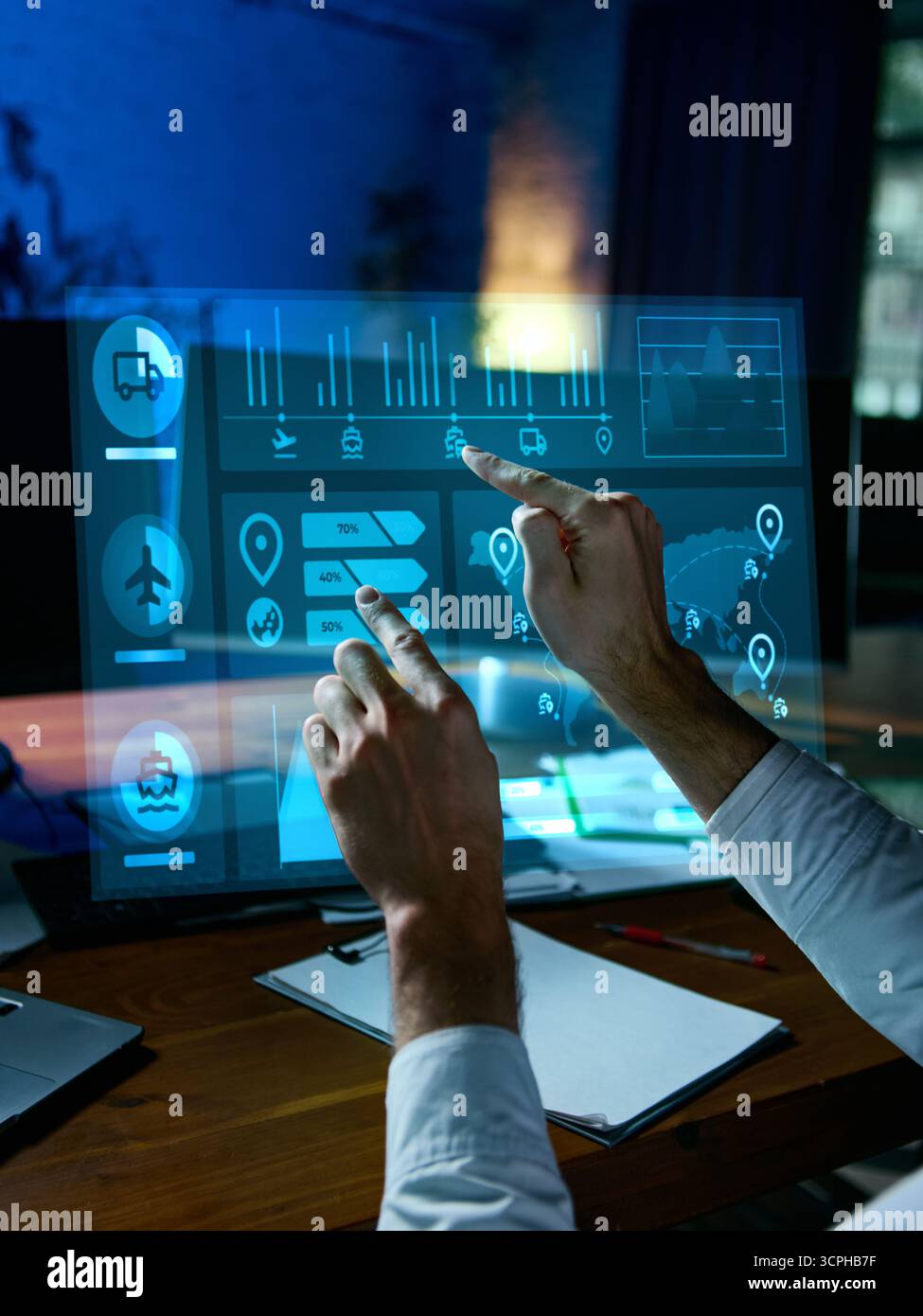 Engineer adjusting futuristic logistics control panel with holographic interface. Collage Stock Photo