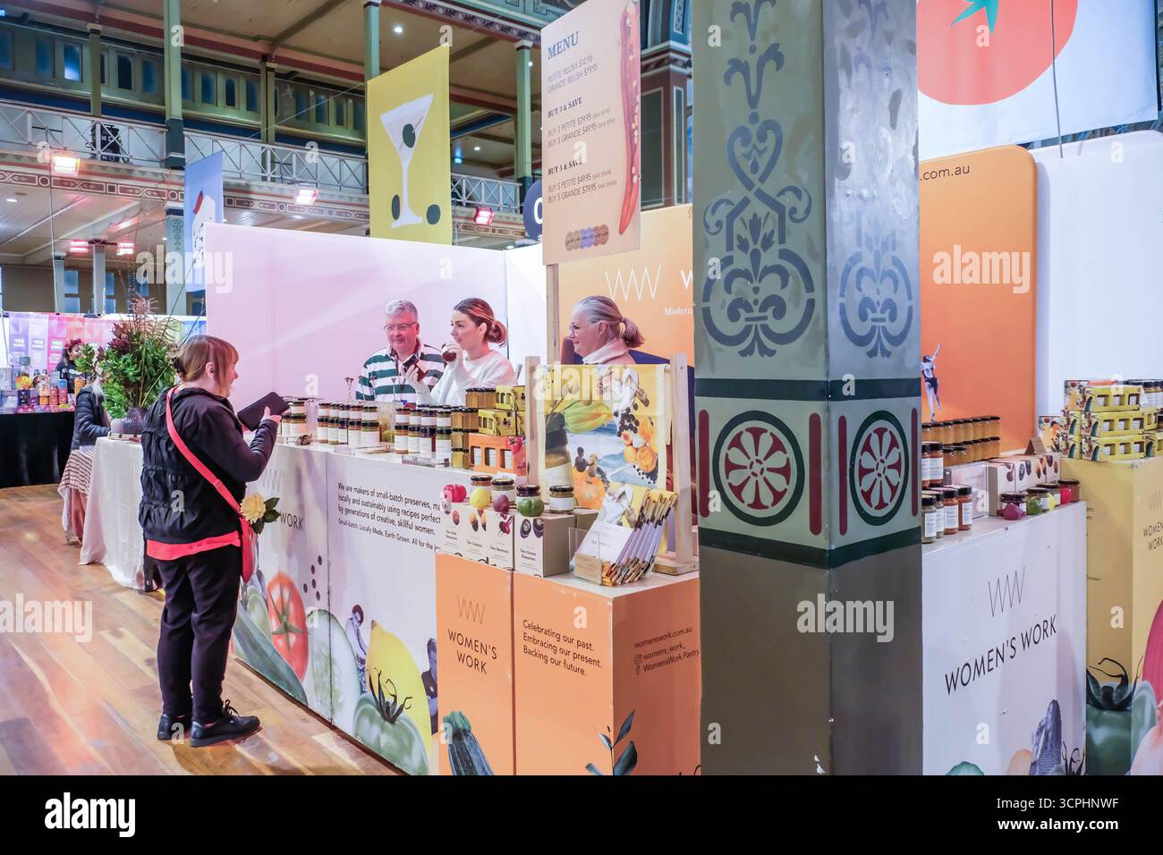 A team of Women's Work condiment maker seen serving customers at the ...