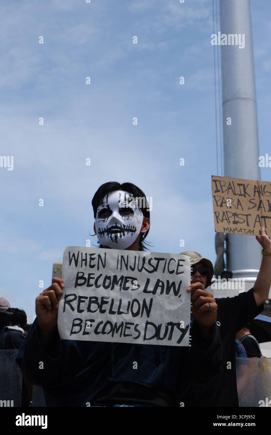 Filipino youth activists gather at Luneta Park in Manila during an anti ...