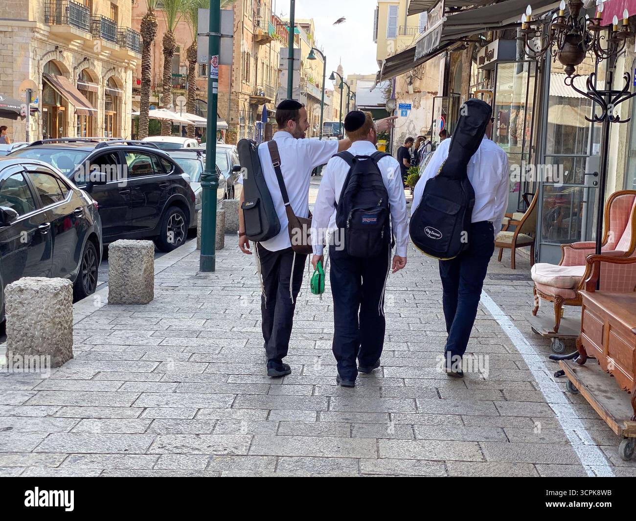 Three figures strolling hi-res stock photography and images - Alamy