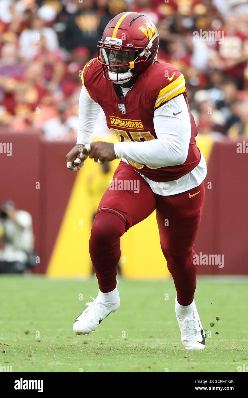 Washington Commanders defensive end Jacob Martin (55) rushes during an ...